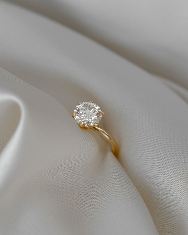 Anillo Solitario Corte Redondo - 0.25ct