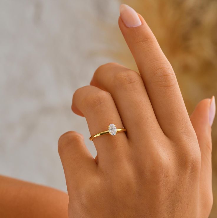 0.5 CT - Anillo Solitario Corte Ovalado